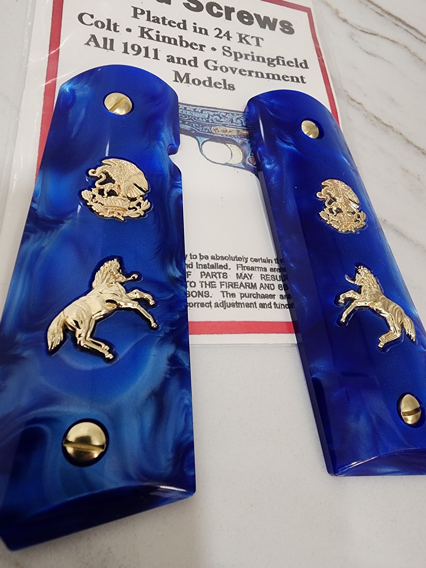 1911 Grips – Royal Swirl Blue Pearl with 24k Gold Plated Mexican Eagle and Rampart Horse Emblems (24k Gold Screws)