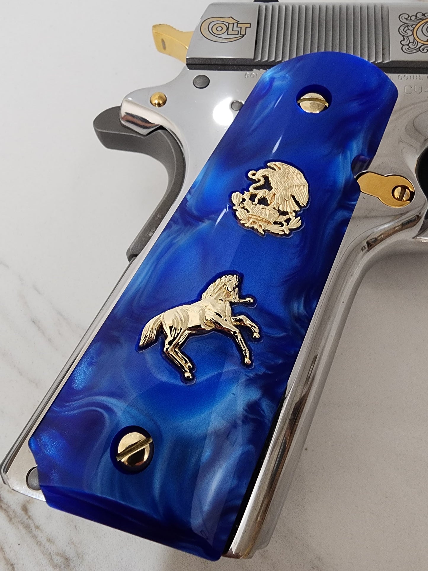 1911 Grips – Royal Swirl Blue Pearl with 24k Gold Plated Mexican Eagle and Rampart Horse Emblems (24k Gold Screws)