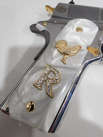 1911 White Pearlite Grips with Gold Plated Rooster, CZ Crystal “R” Letter, Gold Screws – Fits Full Size Government & Commander 1911 (.45 ACP / .38 Super)