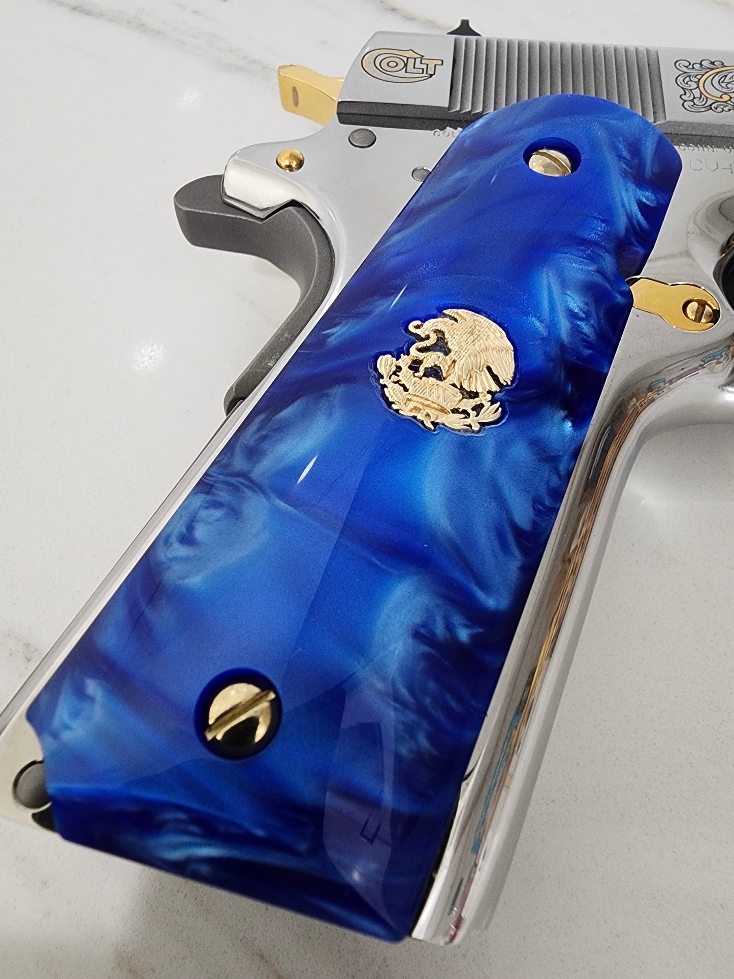 1911 Grips – Royal Swirl Blue Pearl with 24k Gold Plated Mexican Eagle Emblems (24k Gold Screws)
