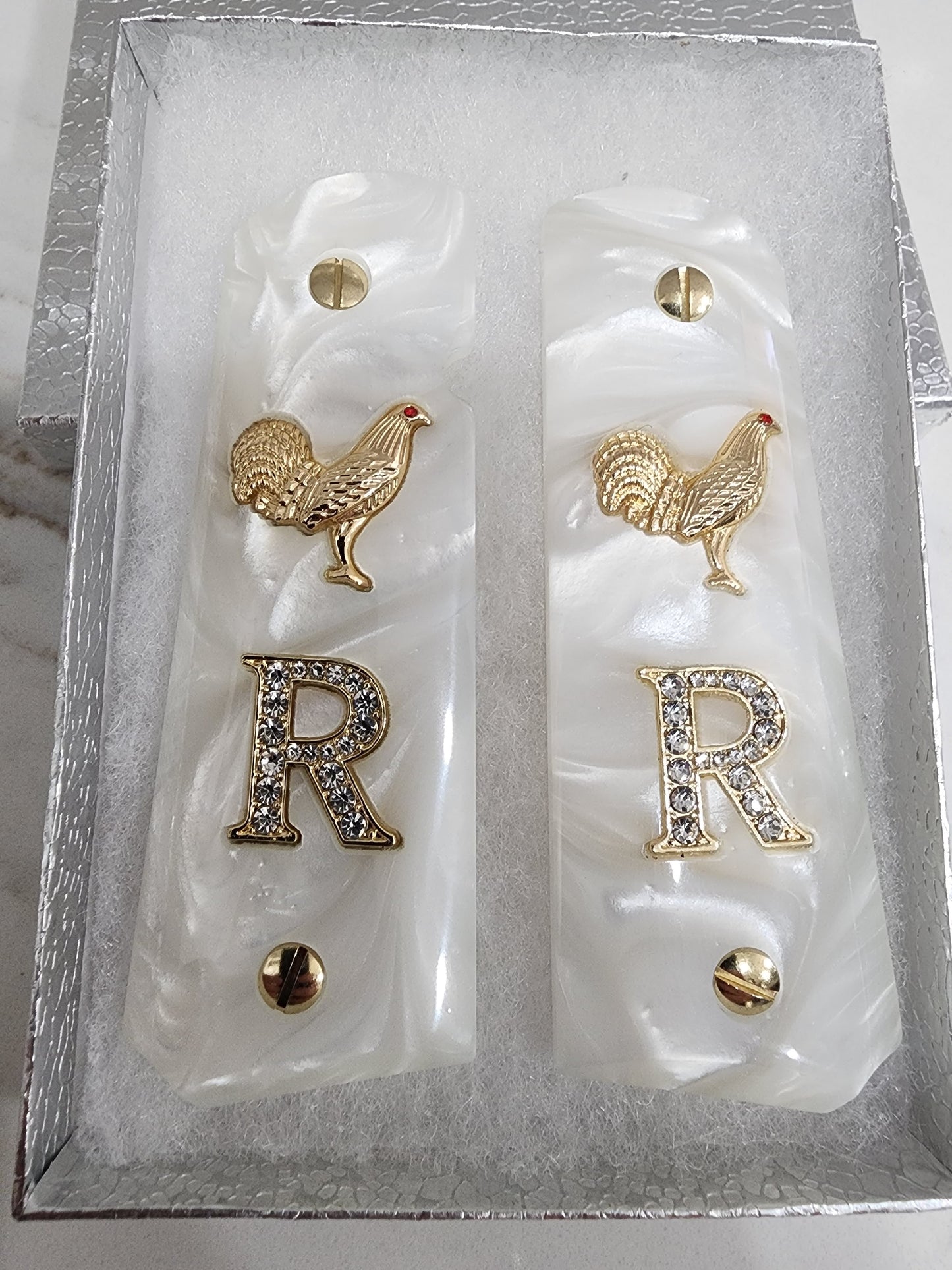 1911 White Pearlite Grips with Gold Plated Rooster, CZ Crystal “R” Letter, Gold Screws – Fits Full Size Government & Commander 1911 (.45 ACP / .38 Super)