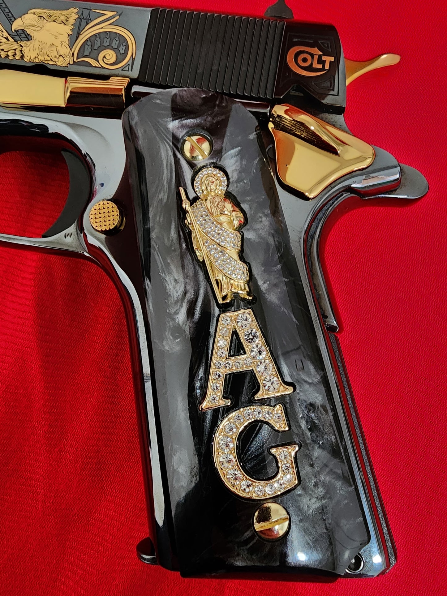 1911 Black Pearlite San Judas Gold Plated & Crystal “A” “G” Grips – .45 ACP / .38 Super (Gold Plated Screws)