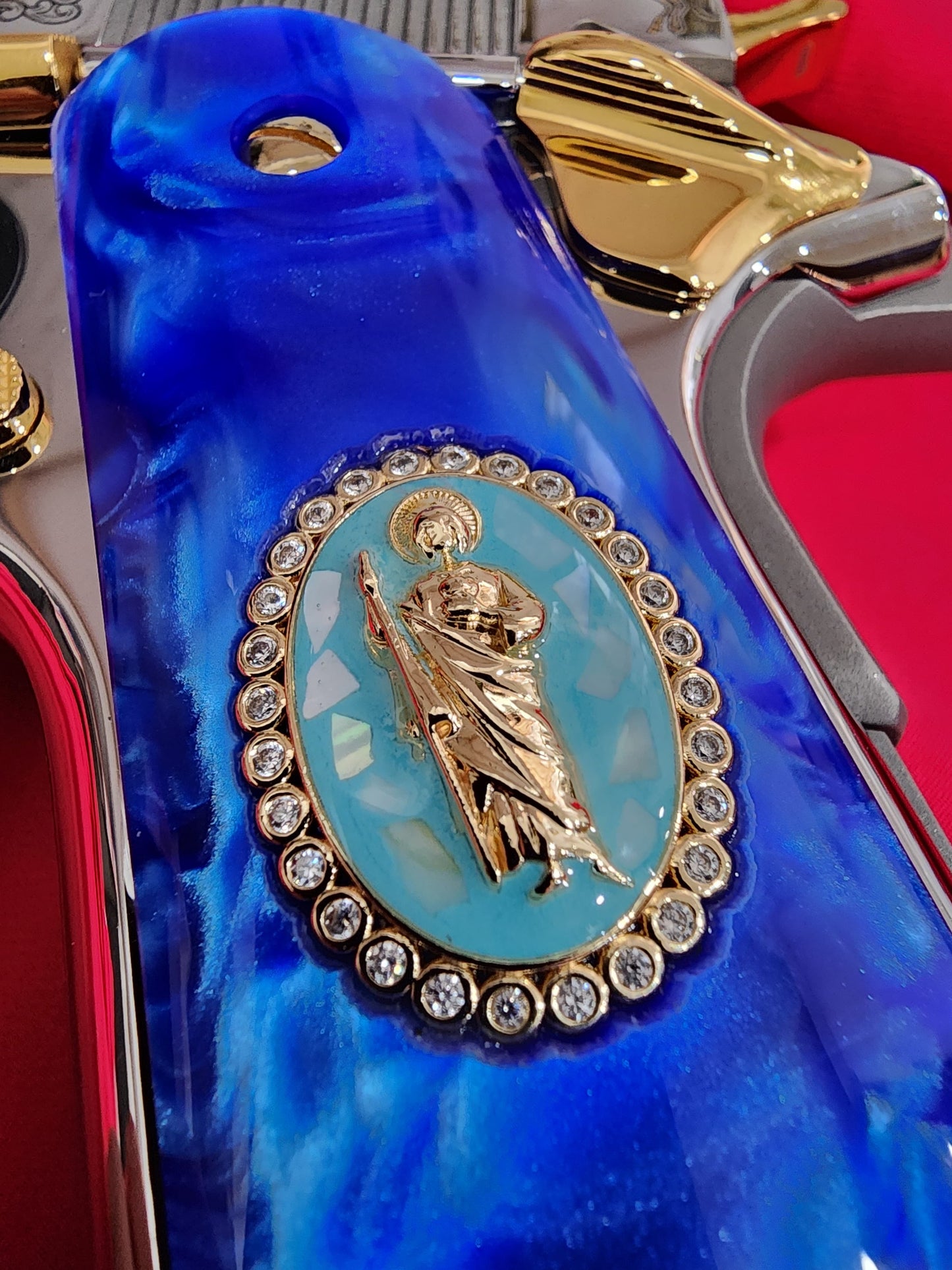 1911 Royal Blue Swirl Pearlite Grip – San Judas Gold Oval Plated with CZ stones border – Government Model