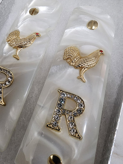 1911 White Pearlite Grips with Gold Plated Rooster, CZ Crystal “R” Letter, Gold Screws – Fits Full Size Government & Commander 1911 (.45 ACP / .38 Super)