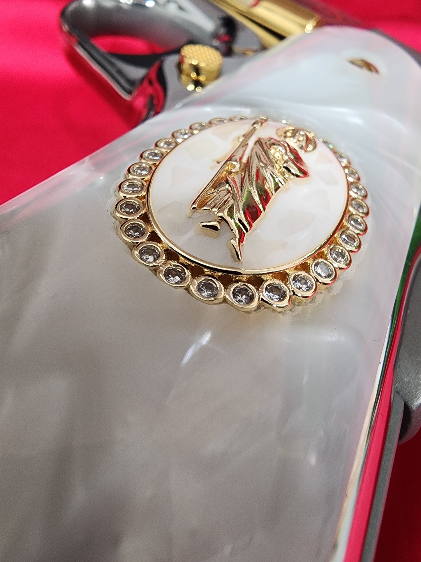 1911 White Pearlite Grip – San Judas Gold Oval Plated with CZ stones border – Government Model