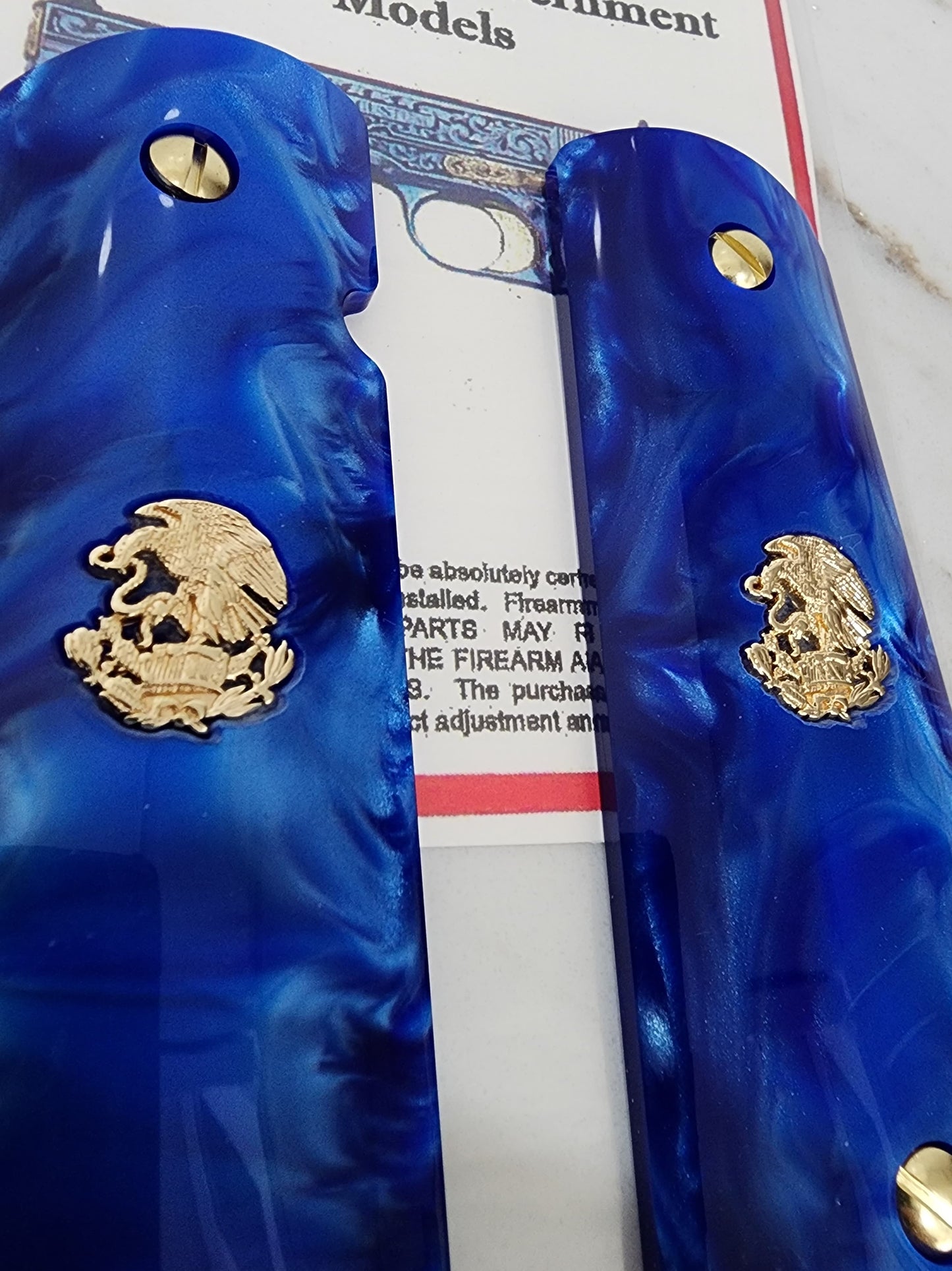 1911 Grips – Royal Swirl Blue Pearl with 24k Gold Plated Mexican Eagle Emblems (24k Gold Screws)
