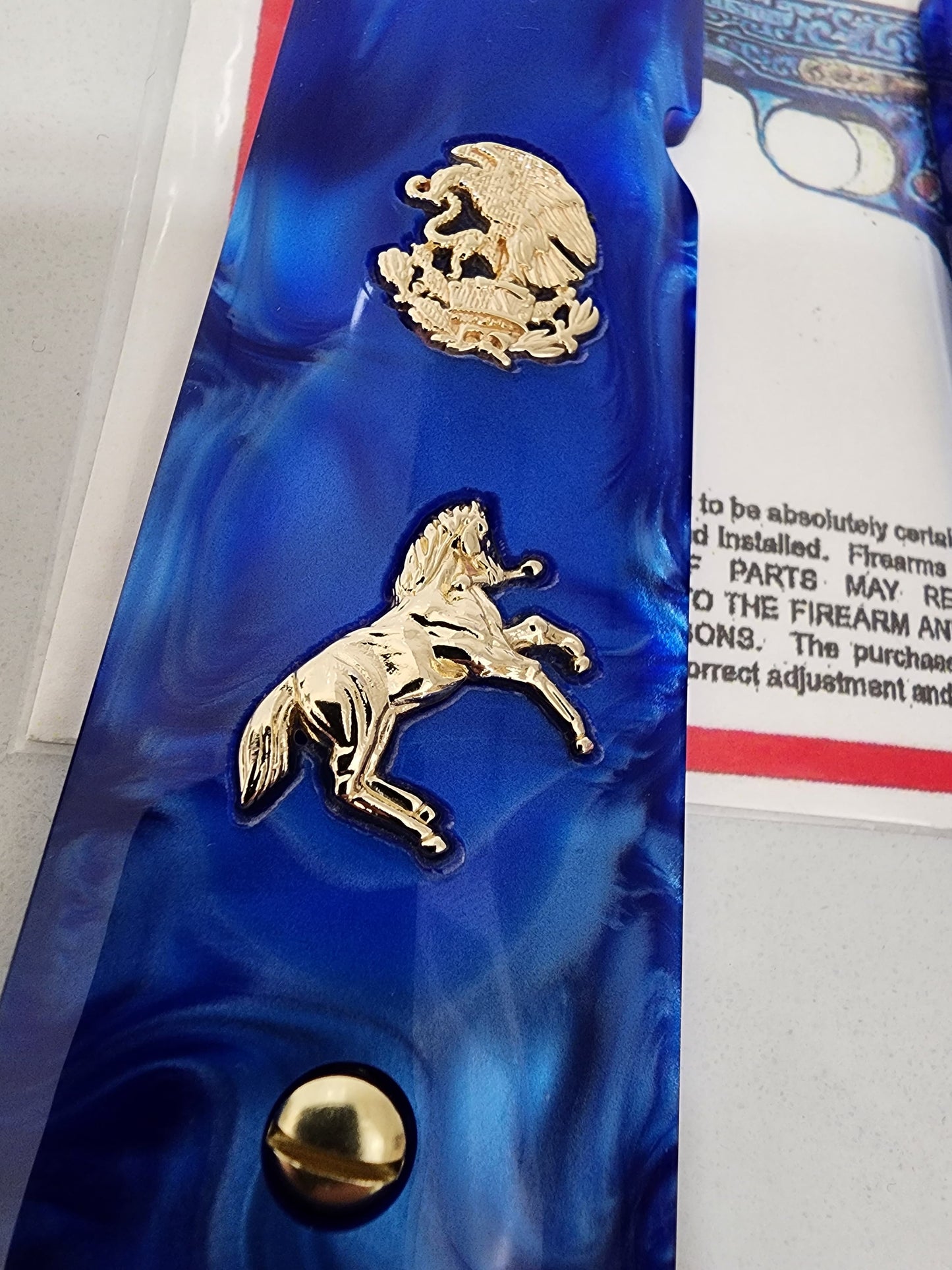 1911 Grips – Royal Swirl Blue Pearl with 24k Gold Plated Mexican Eagle and Rampart Horse Emblems (24k Gold Screws)