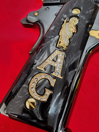 1911 Black Pearlite San Judas Gold Plated & Crystal “A” “G” Grips – .45 ACP / .38 Super (Gold Plated Screws)